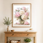 Finished pink and white peonies in clear glass vase cross stitch artwork displayed as home decor