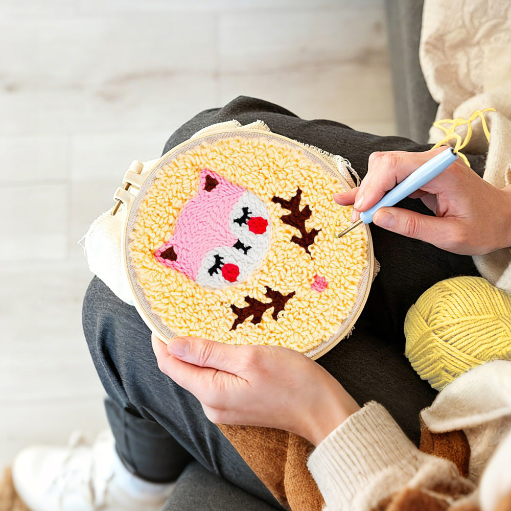 Creating handmade pink baby fox punch needle artwork