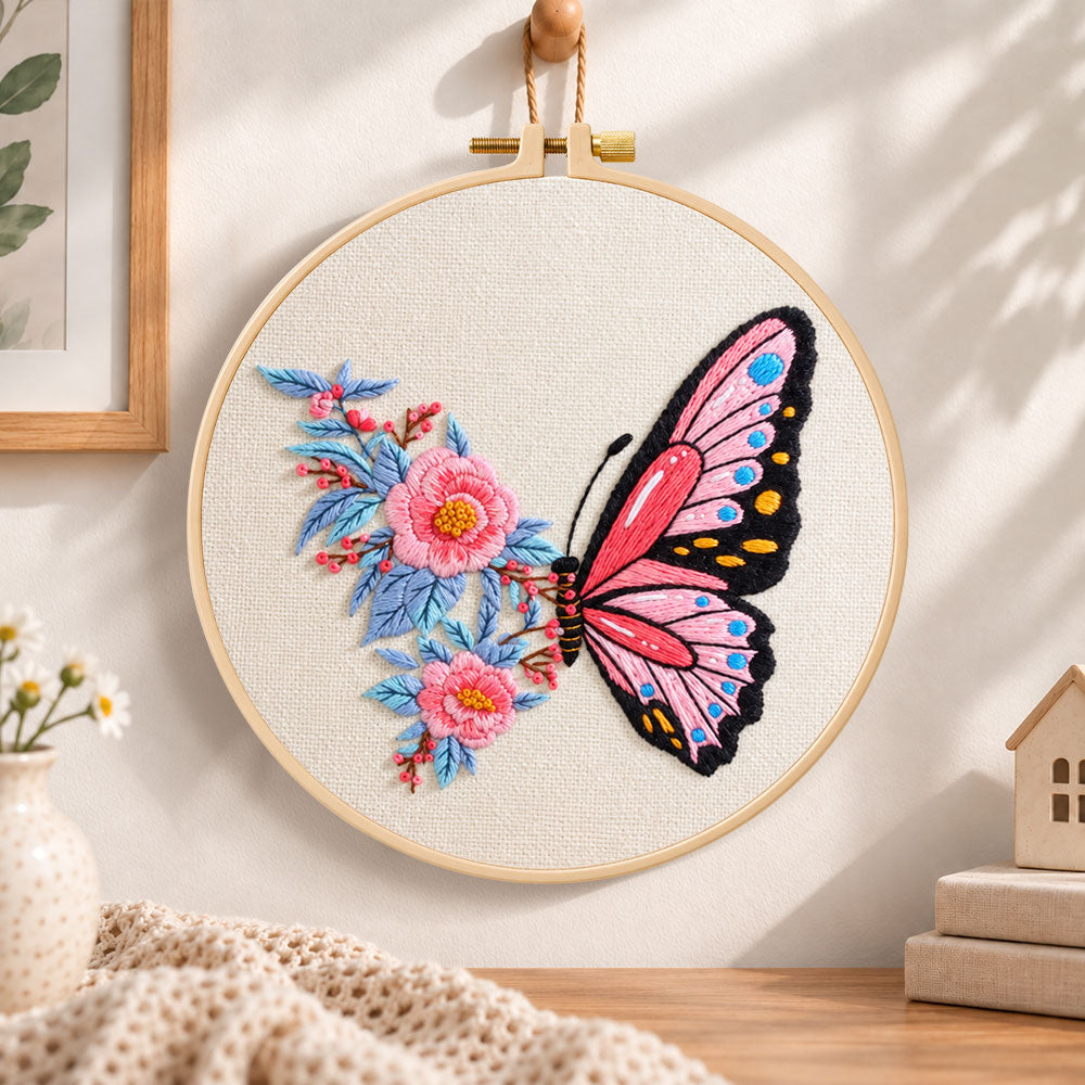 Pink butterfly with peony embroidery hoop wall art displayed as warm and cozy handmade home decor