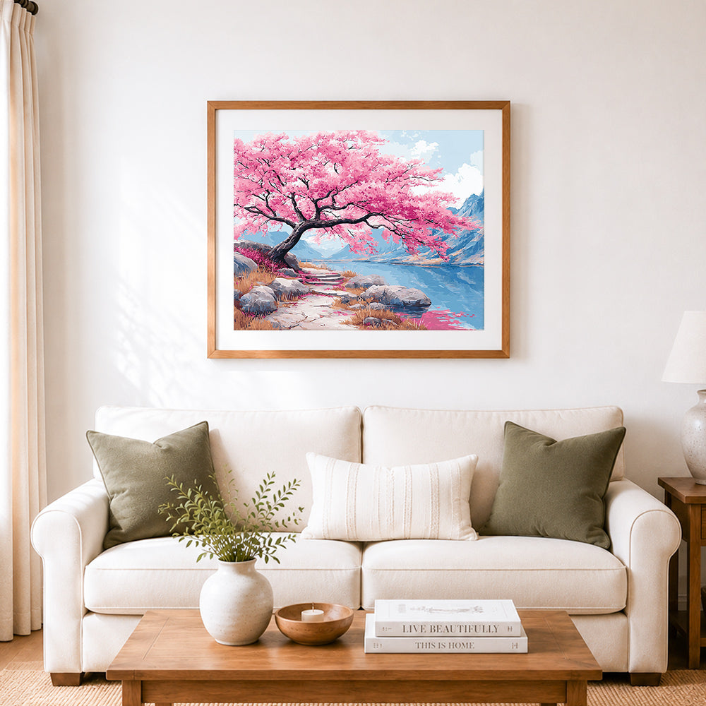 Finished pink cherry tree by the lake cross stitch artwork displayed as home decor