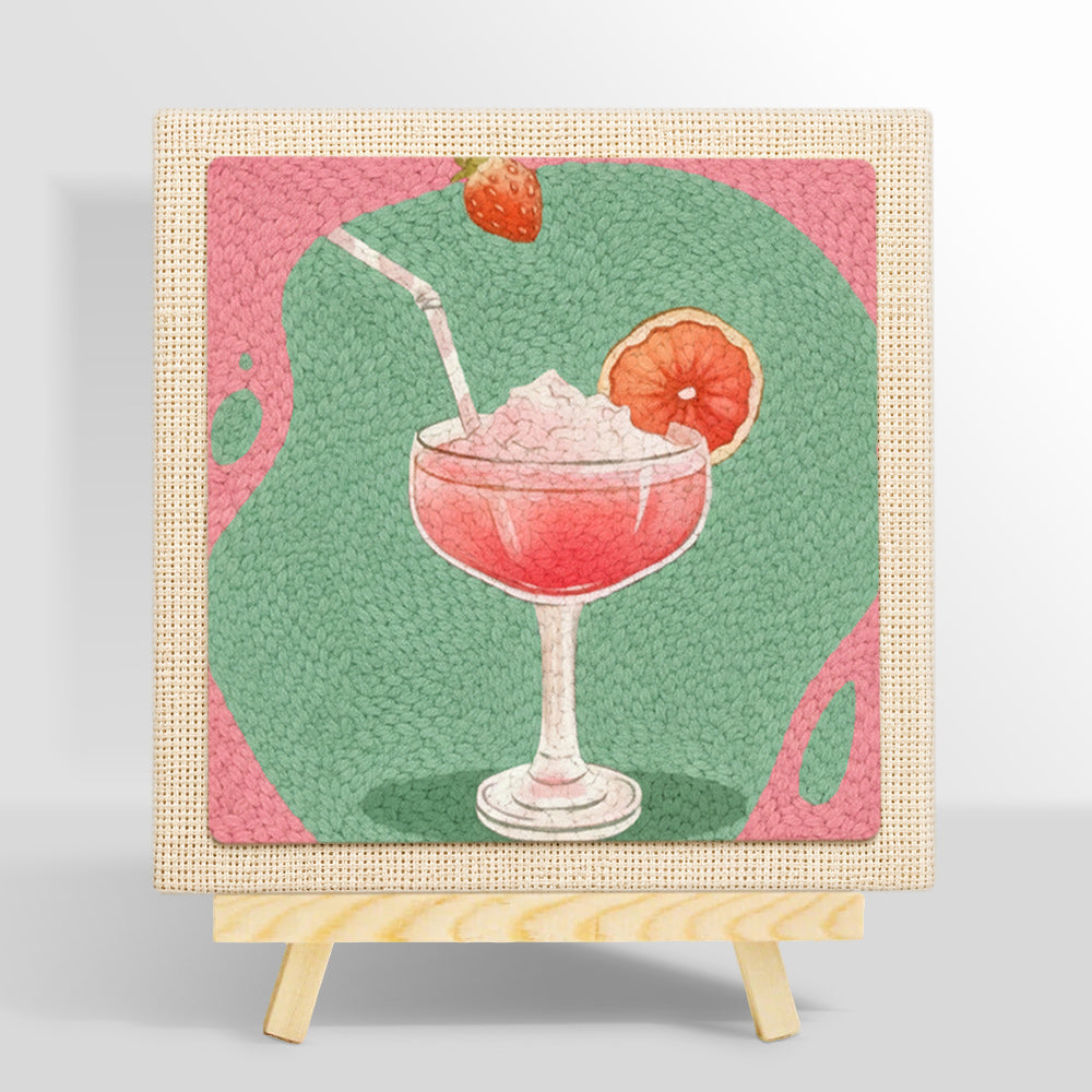 Pink cocktail with grapefruit punch needle kit for beginners