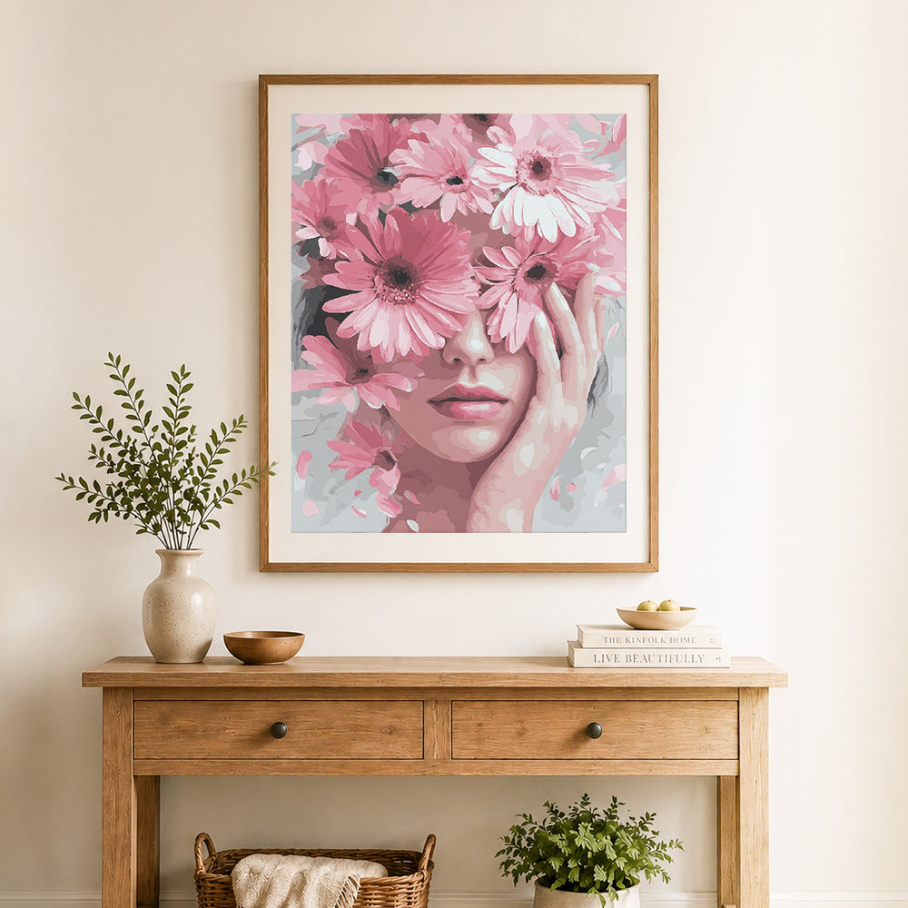Finished pink daisy beauty cross stitch artwork displayed as home decor