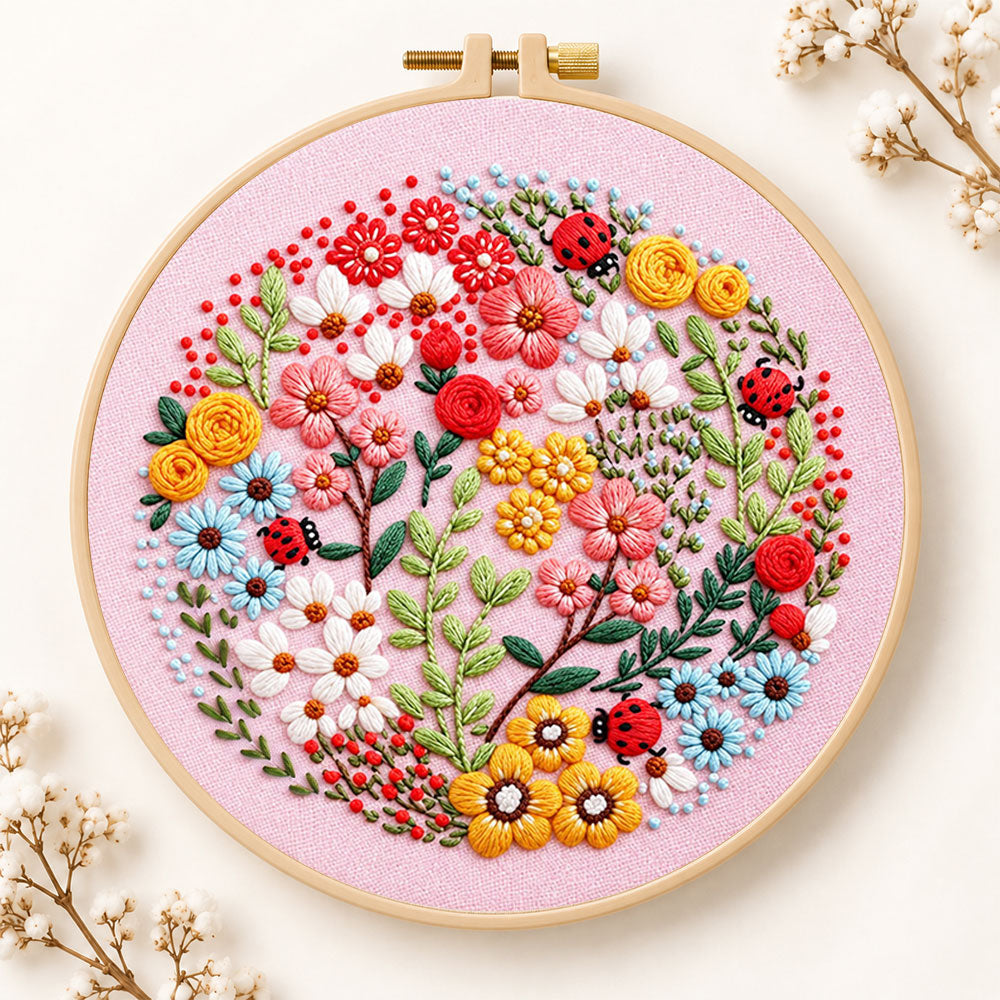 Pink floral art with ladybugs embroidery kit
