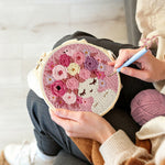 Creating handmade pink floral crown girl punch needle artwork