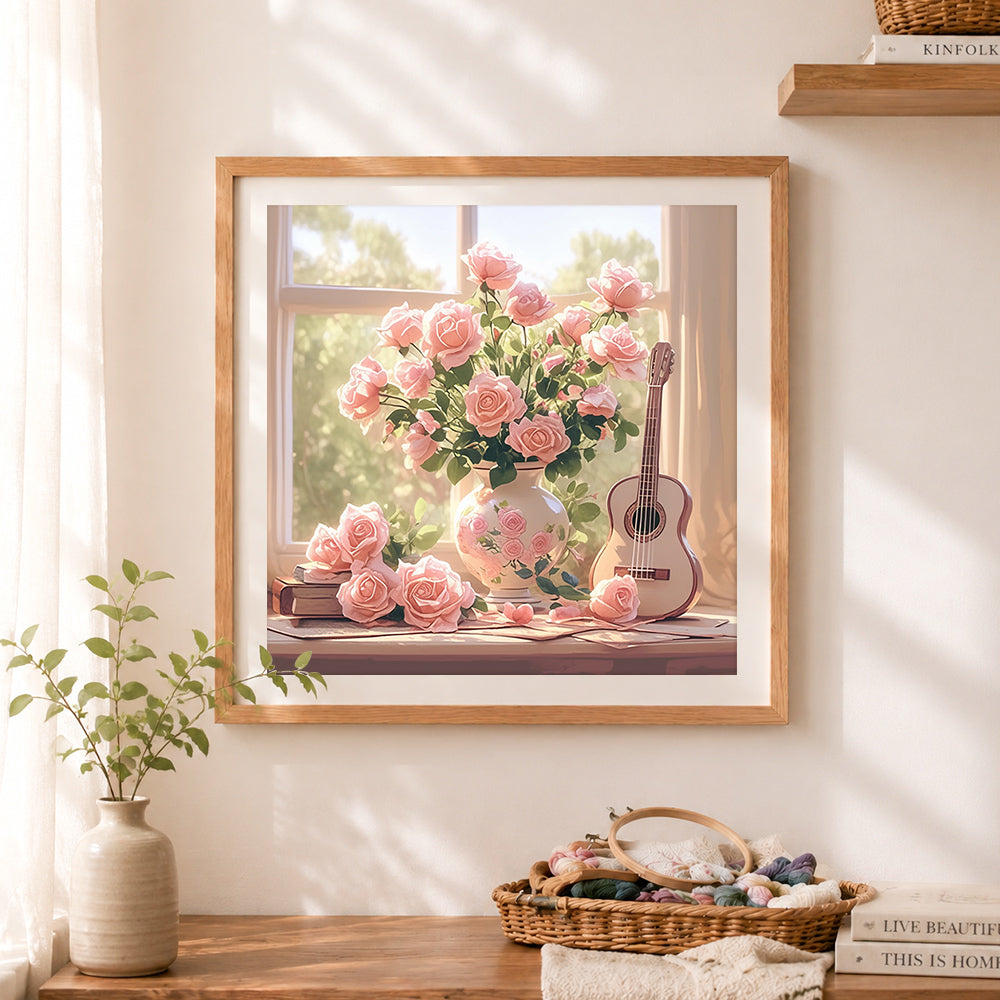 Finished pink roses, vintage guitar and books cross stitch artwork displayed as home decor
