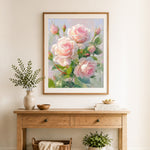 Finished pink roses with dew drops cross stitch artwork displayed as home decor
