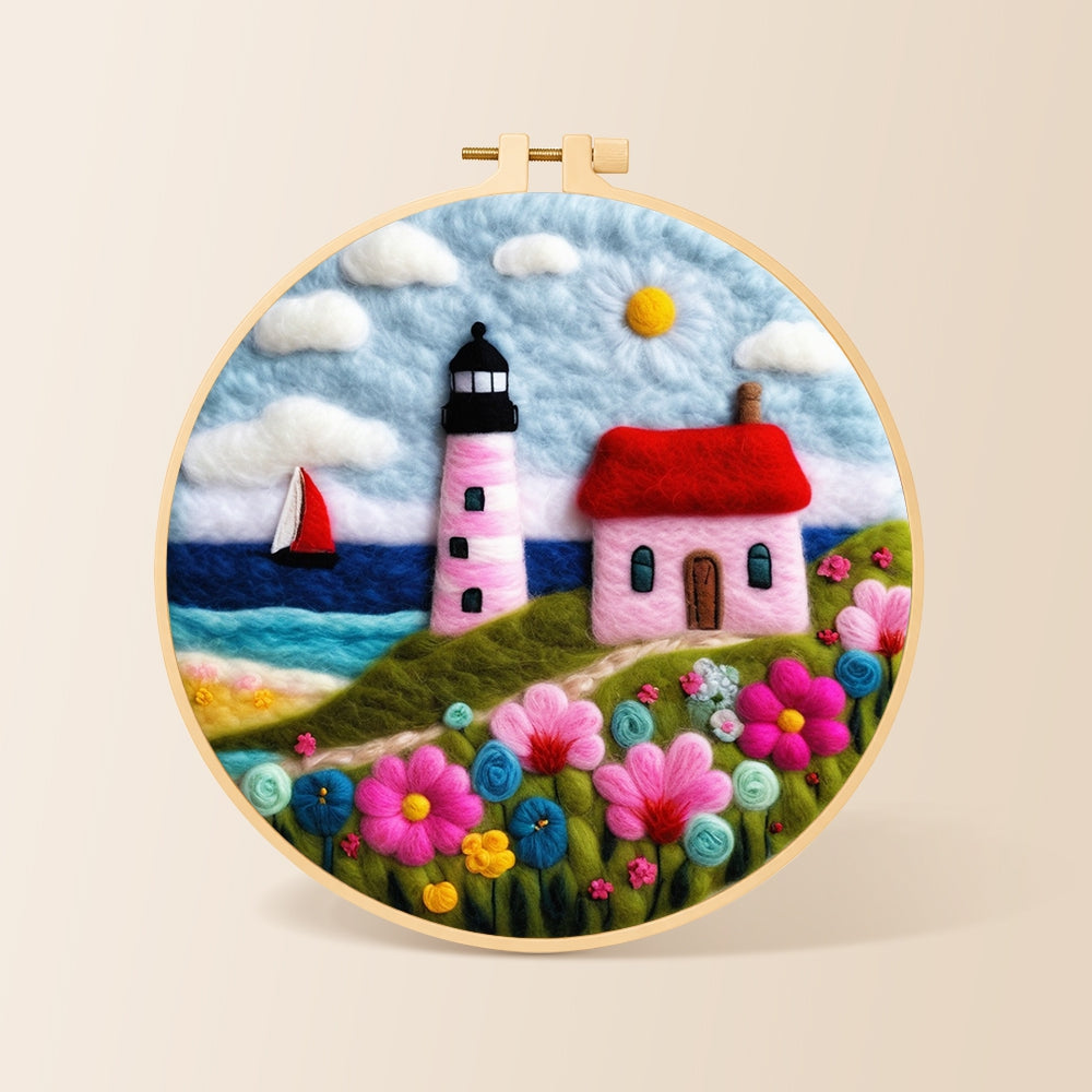 Pink striped lighthouse and flowers needle felting kit for beginners with a round wooden frame
