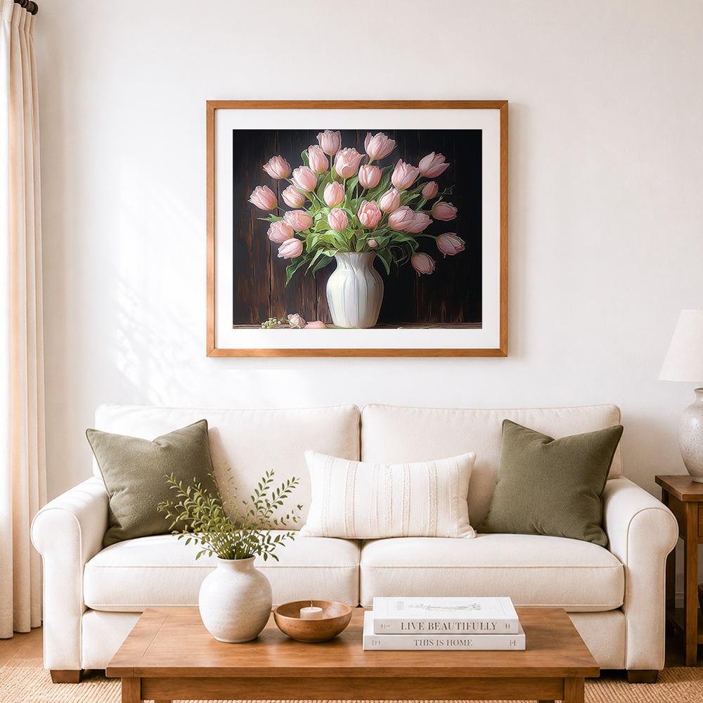 Finished pink tulip bouquet cross stitch artwork displayed as home decor