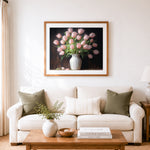 Finished pink tulip bouquet cross stitch artwork displayed as home decor
