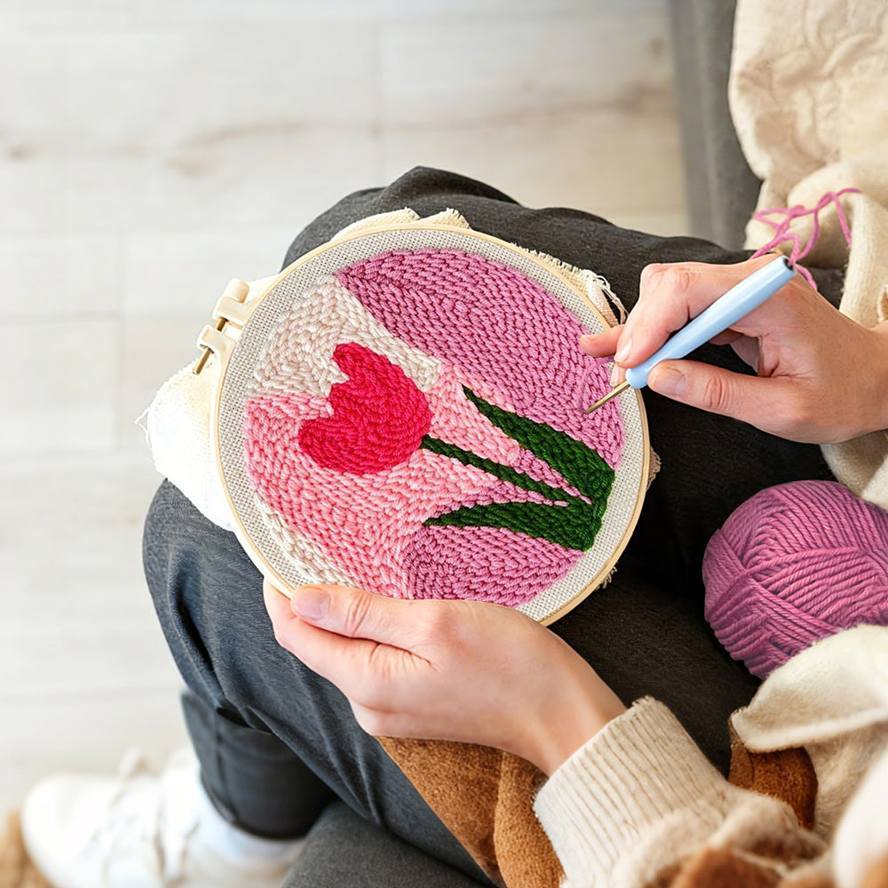 Creating handmade pink tulip punch needle artwork