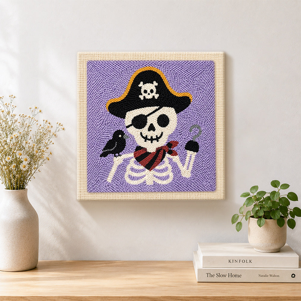 Finished pirate skeleton artwork displayed on a wall