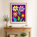 Finished playful floral art cross stitch artwork displayed as home decor