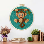 Finished playful little monkey artwork displayed on a wall