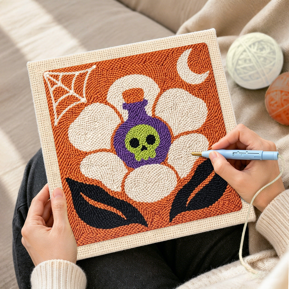 Creating handmade poison skull blossom punch needle artwork