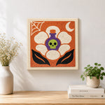 Finished poison skull blossom artwork displayed on a wall
