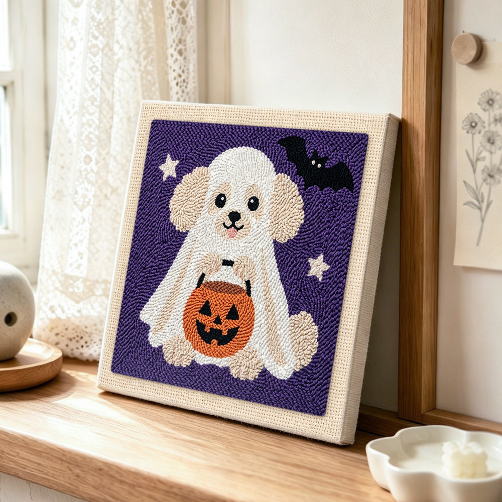 Poodle ghost trick or treat punch needle artwork displayed on a table