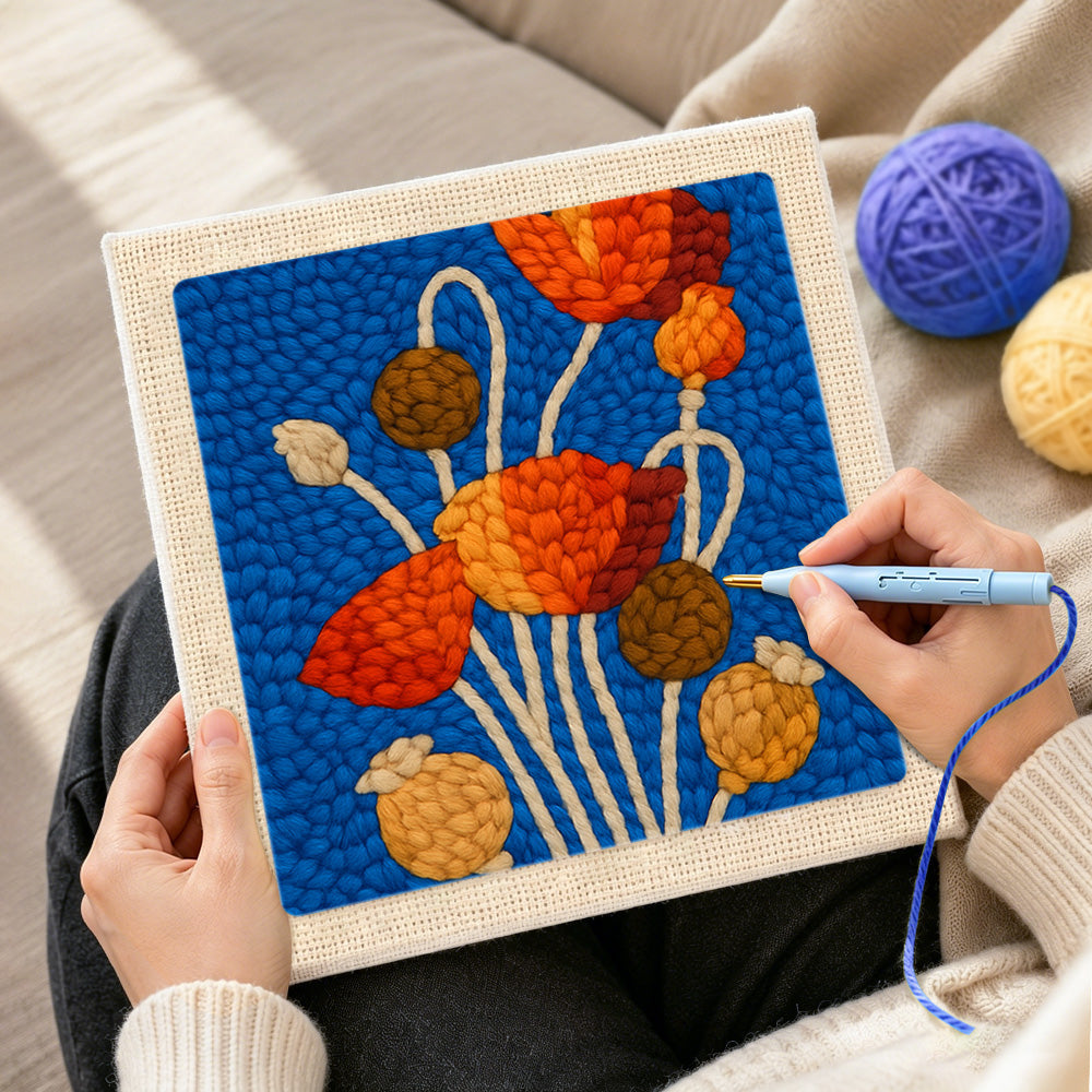 Creating handmade poppy flowers and seeds punch needle artwork