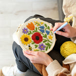 Creating handmade poppy, sunflower and bumblebee punch needle artwork