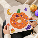 Creating handmade pumpkin donut treat punch needle artwork