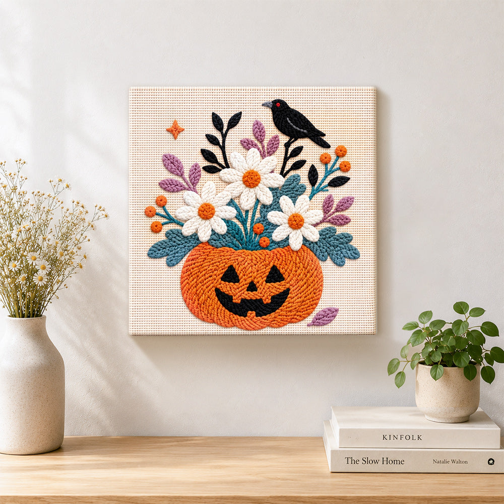 Finished pumpkin floral crow artwork displayed on a wall