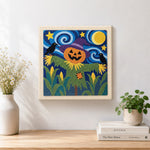 Finished pumpkin head scarecrow artwork displayed on a wall