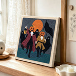 Pumpkin heads parade punch needle artwork displayed on a table