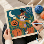Creating handmade pumpkin patch scarecrow punch needle artwork