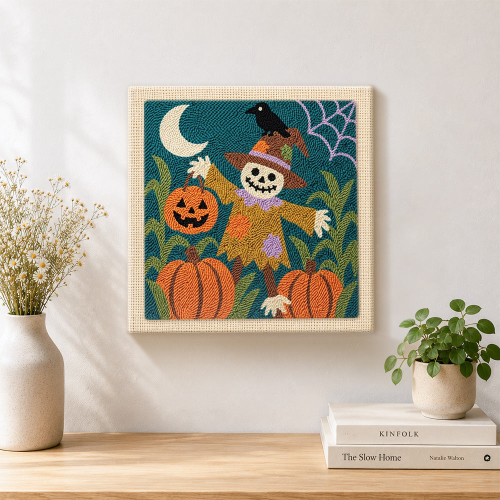 Finished pumpkin patch scarecrow artwork displayed on a wall