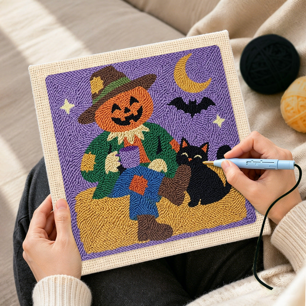 Creating handmade pumpkin scarecrow punch needle artwork