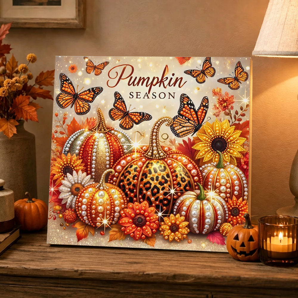 Finished pumpkin season with butterflies pearl diamond painting artwork displayed as holiday home decor