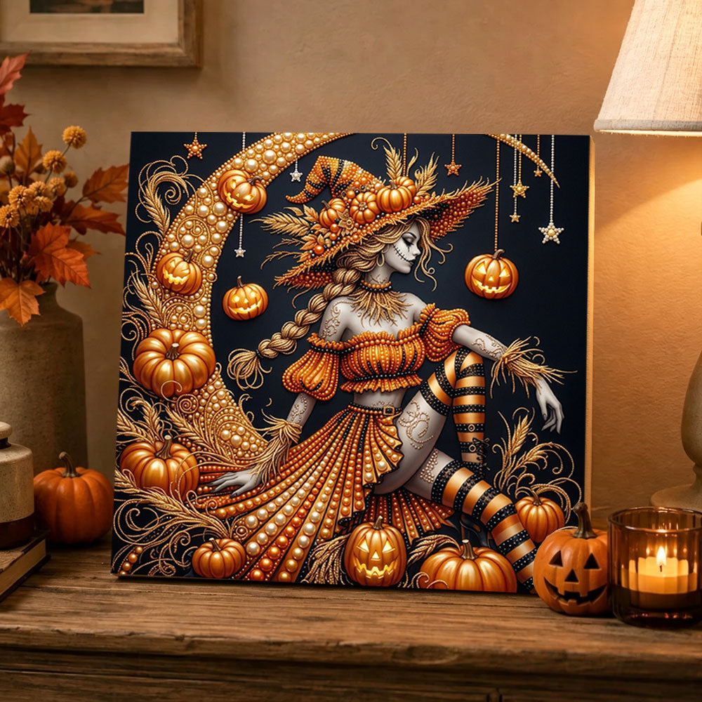 Finished pumpkin witch on crescent moon pearl diamond painting artwork displayed as holiday home decor