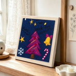 Punk christmas tree decor punch needle artwork displayed on a table
