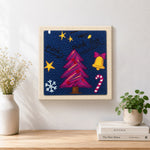 Finished punk christmas tree decor artwork displayed on a wall
