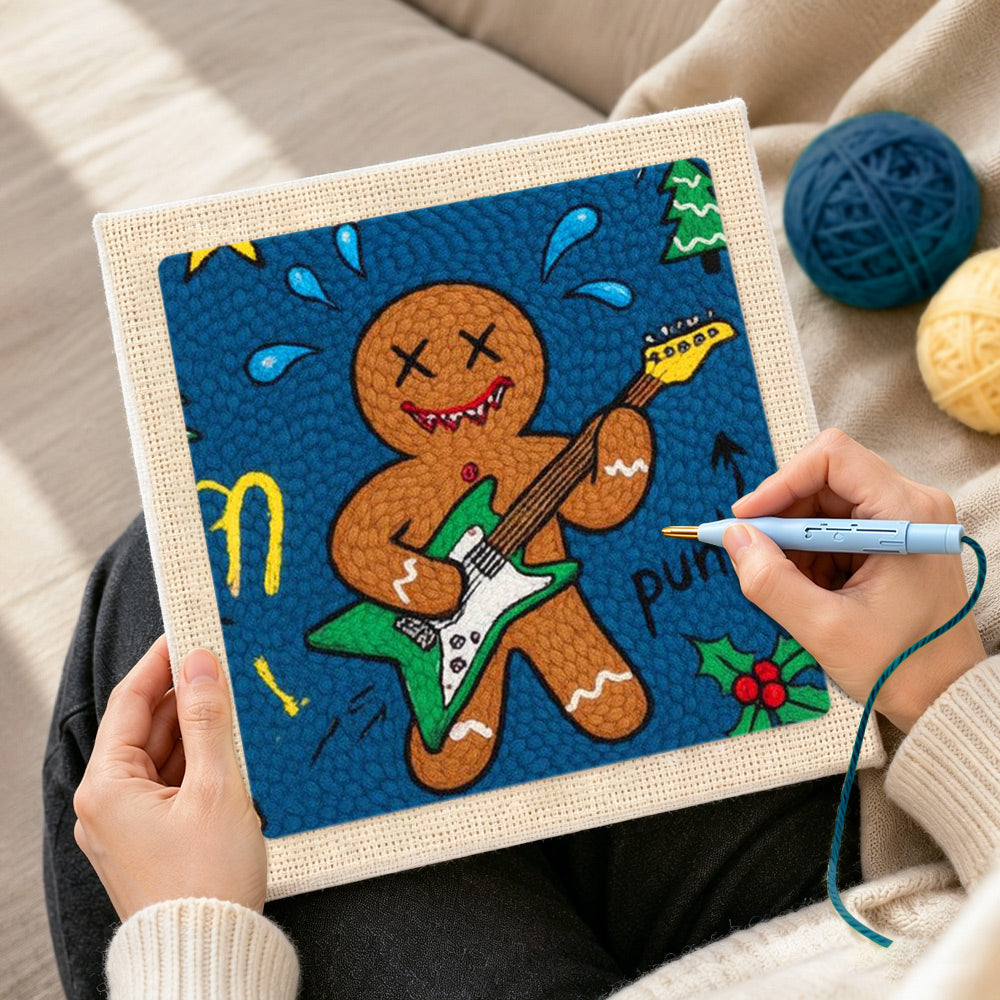 Creating handmade punk gingerbread man playing guitar punch needle artwork
