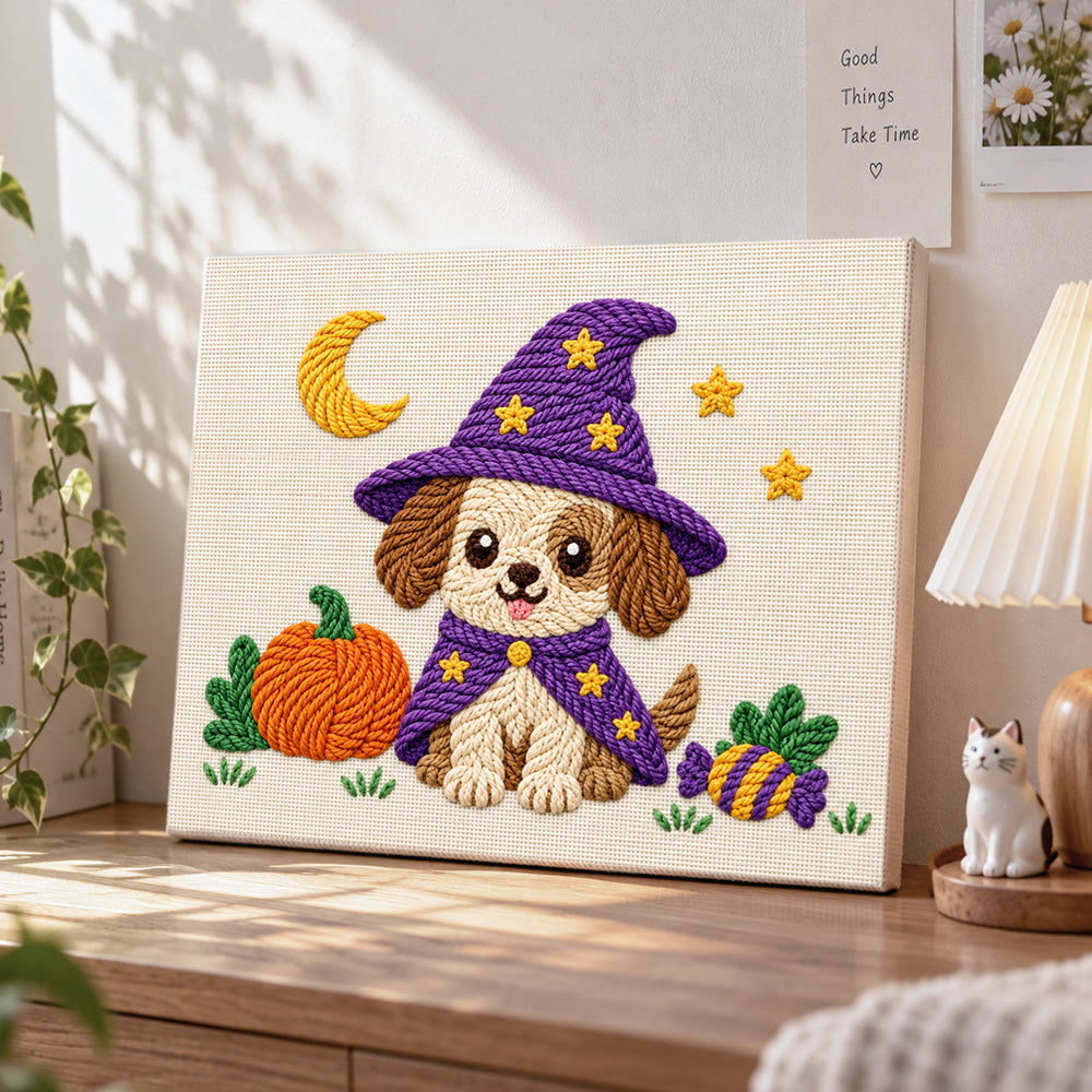 Puppy witch for halloween punch needle artwork displayed on a table