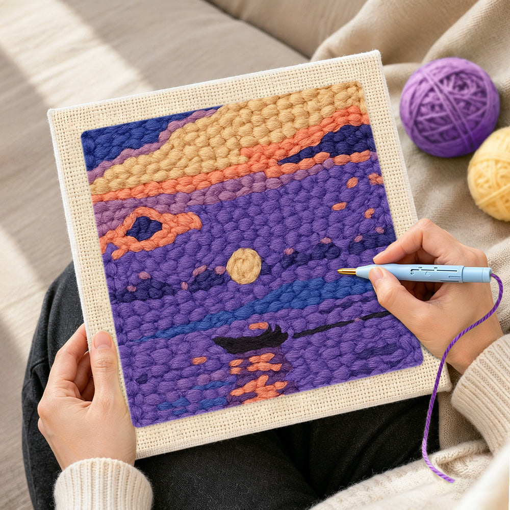 Creating handmade purple lake and little boat punch needle artwork