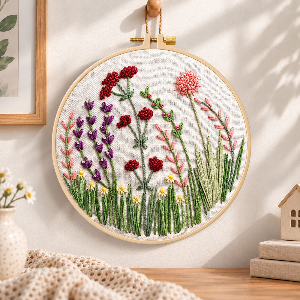 Purple meadow flowers embroidery hoop wall art displayed as warm and cozy handmade home decor