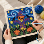Creating handmade purple outfit scarecrow punch needle artwork