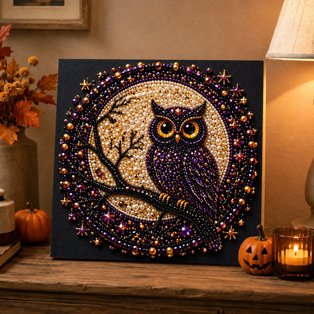 Finished purple owl on moonlit branch pearl diamond painting artwork displayed as holiday home decor