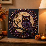 Finished purple owl on moonlit branch pearl diamond painting artwork displayed as holiday home decor