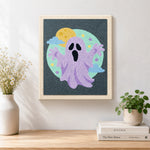 Finished purple spooky ghost artwork displayed on a wall
