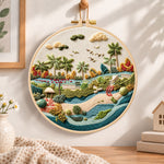 Quiet riverside tropics embroidery hoop wall art displayed as warm and cozy handmade home decor