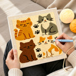 Creating handmade quirky multi-colored kitty punch needle artwork