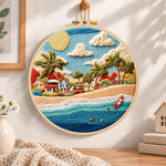 Radiant coastal hamlet embroidery hoop wall art displayed as warm and cozy handmade home decor