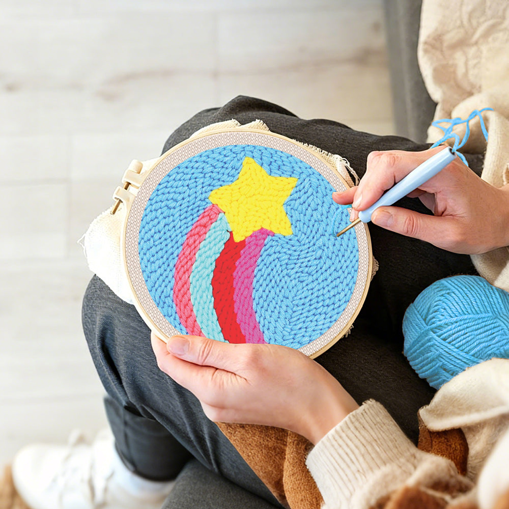 Creating handmade rainbow arcs and star punch needle artwork