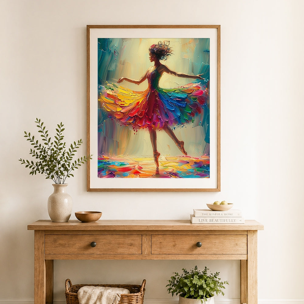 Finished rainbow ballerina spinning cross stitch artwork displayed as home decor
