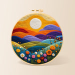 Rainbow hills with blooming flowers at sunset needle felting kit for beginners with a round wooden frame