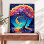 Finished rainbow moon tree pearl diamond painting artwork displayed as home decor