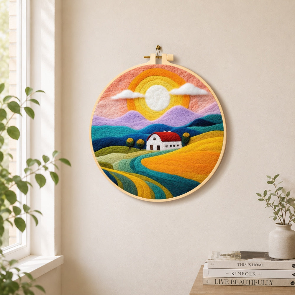 Rainbow mountains at sunset needle felt wall art displayed in a bright home interior