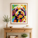 Finished rainbow pop puppy cross stitch artwork displayed as home decor